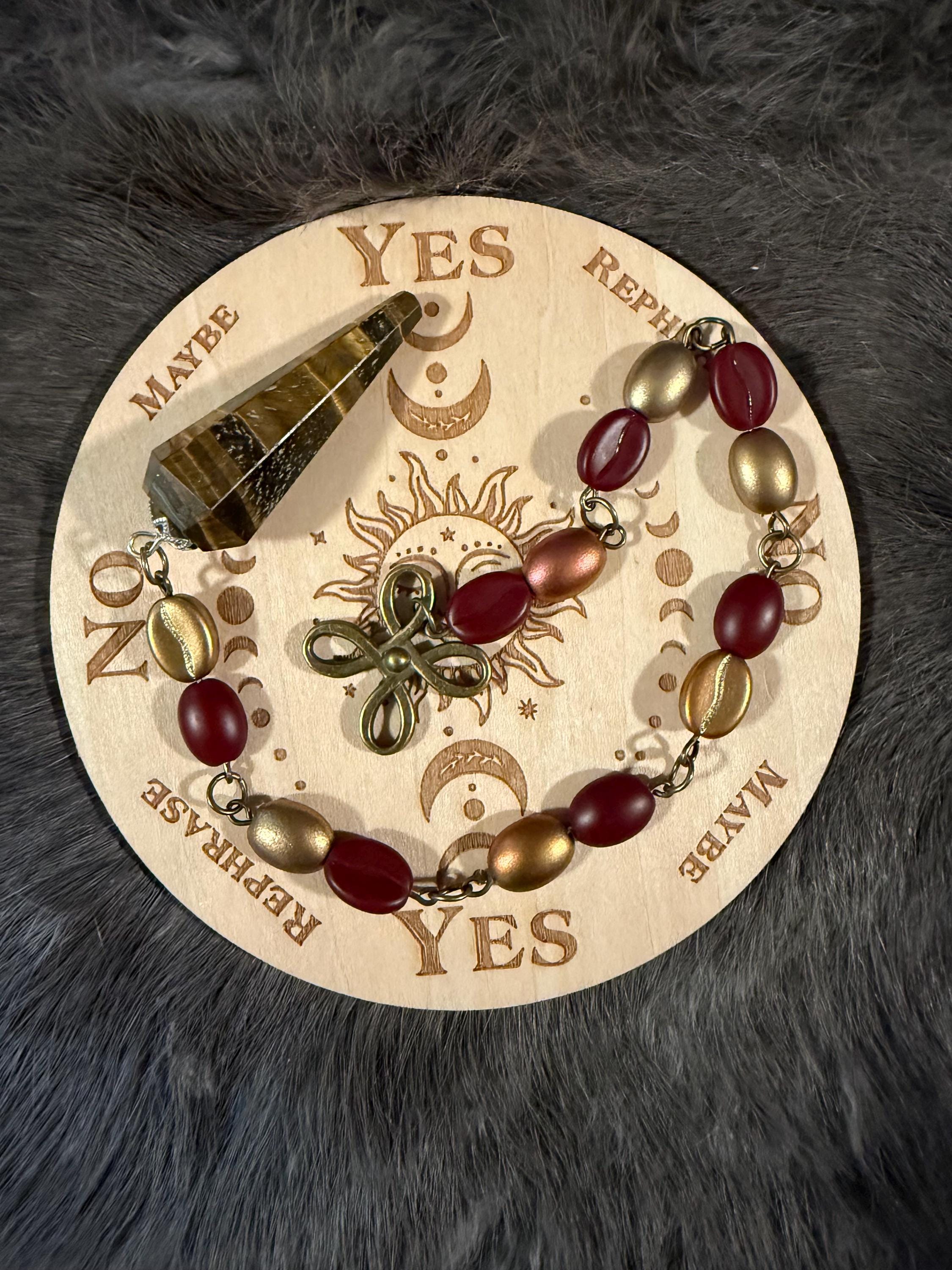 Tiger's Eye Pendulum: Beaded Divination Tool with Celtic Knot