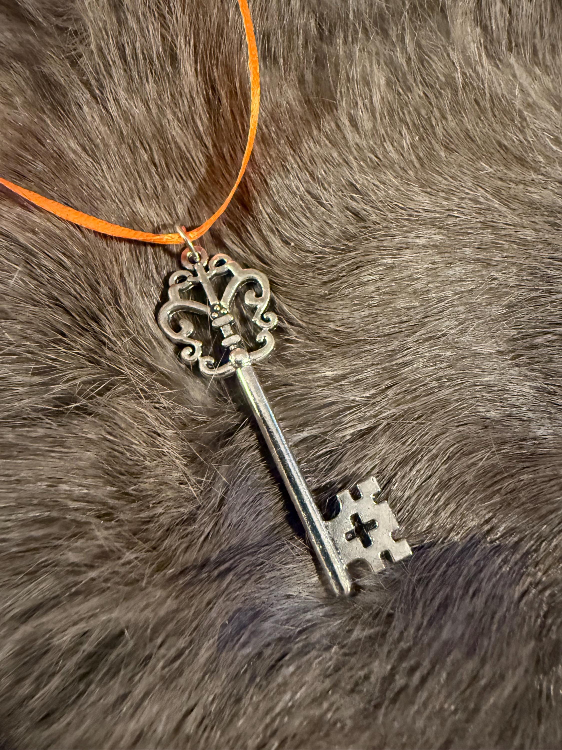 Silver Key On A Ribbon: Road Opener Witchcraft