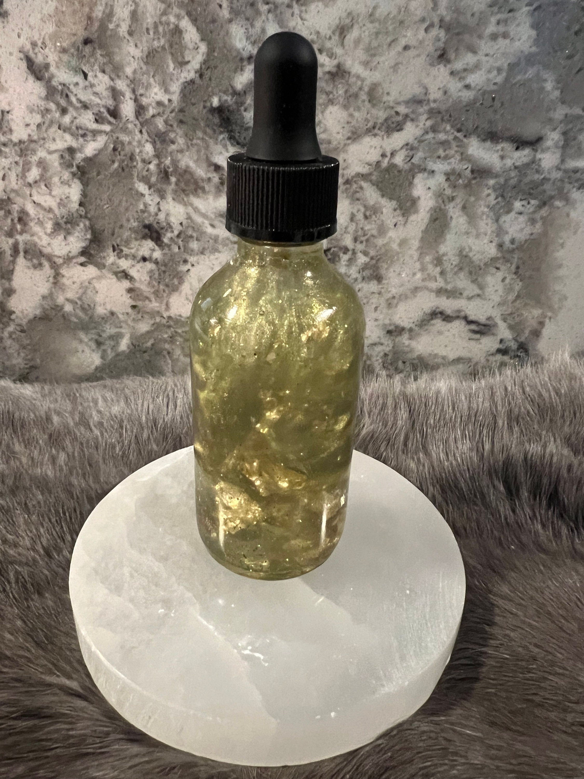 Manifesting Money Spell Oil: Gold Flakes, Jade & Peridot Infused (2oz)