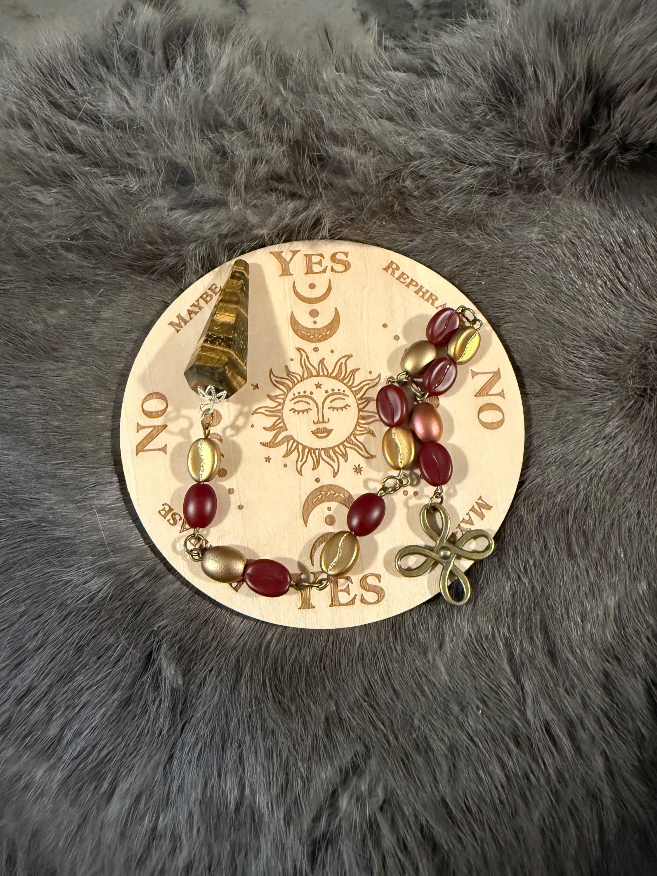 Tiger's Eye Pendulum: Beaded Divination Tool with Celtic Knot