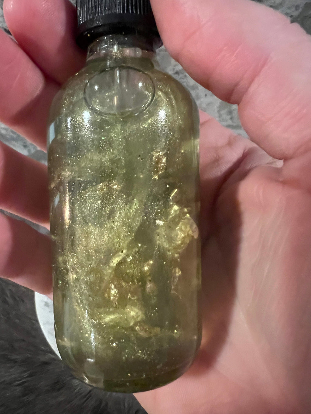 Manifesting Money Spell Oil: Gold Flakes, Jade & Peridot Infused (2oz)
